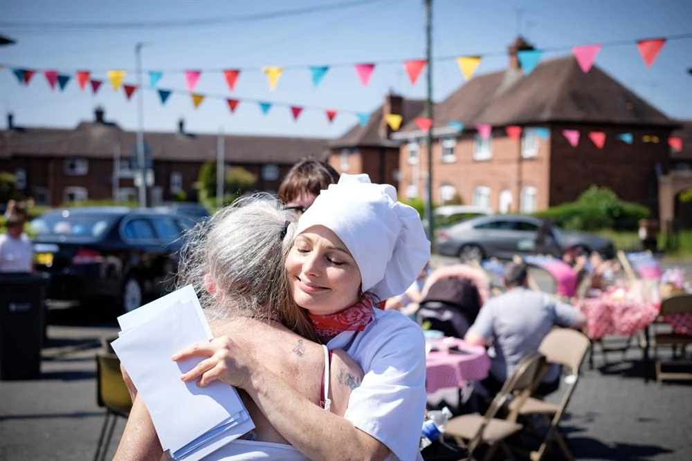 Two people hugging