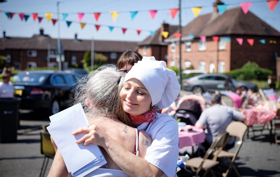 Two people hugging